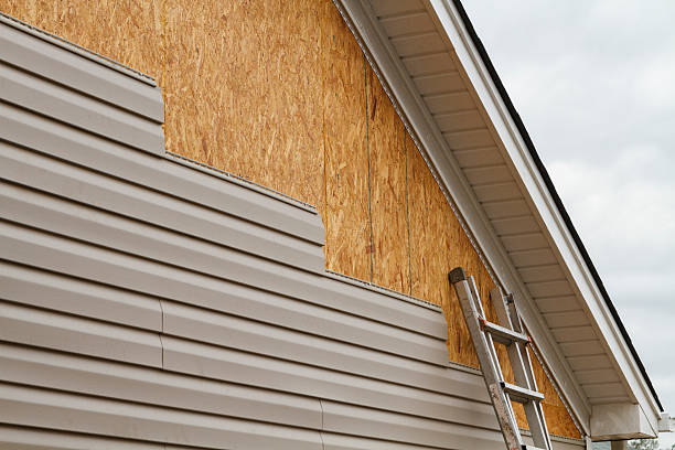 Professional Emergency Siding Repair technician working in Adamstown, MD